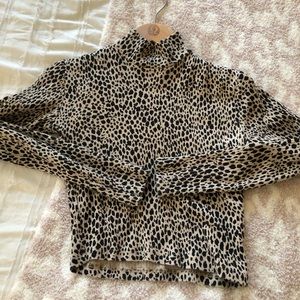 Brandy Melville cheetah print long sleeved top